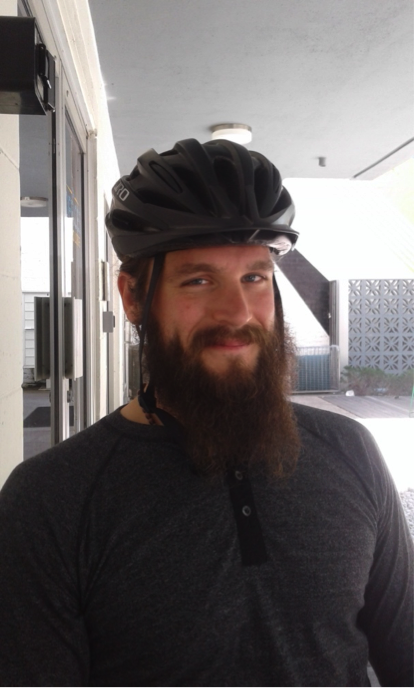 An image of a bearded mercy pedaler volunteer
